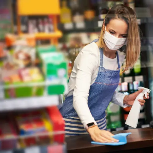 Professional cleaner polishing a retail floor for inviting first impressions