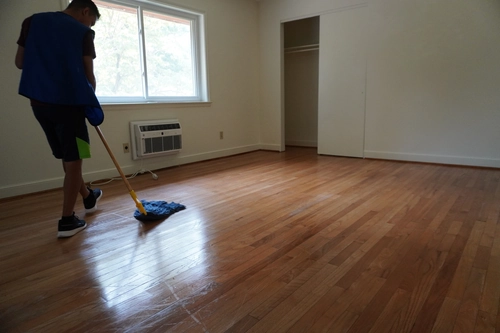 Mopping the floor as part of a thorough move-in clean