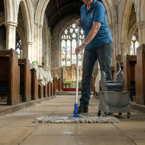 Cleaner following a daily sanctuary cleaning routine in the church